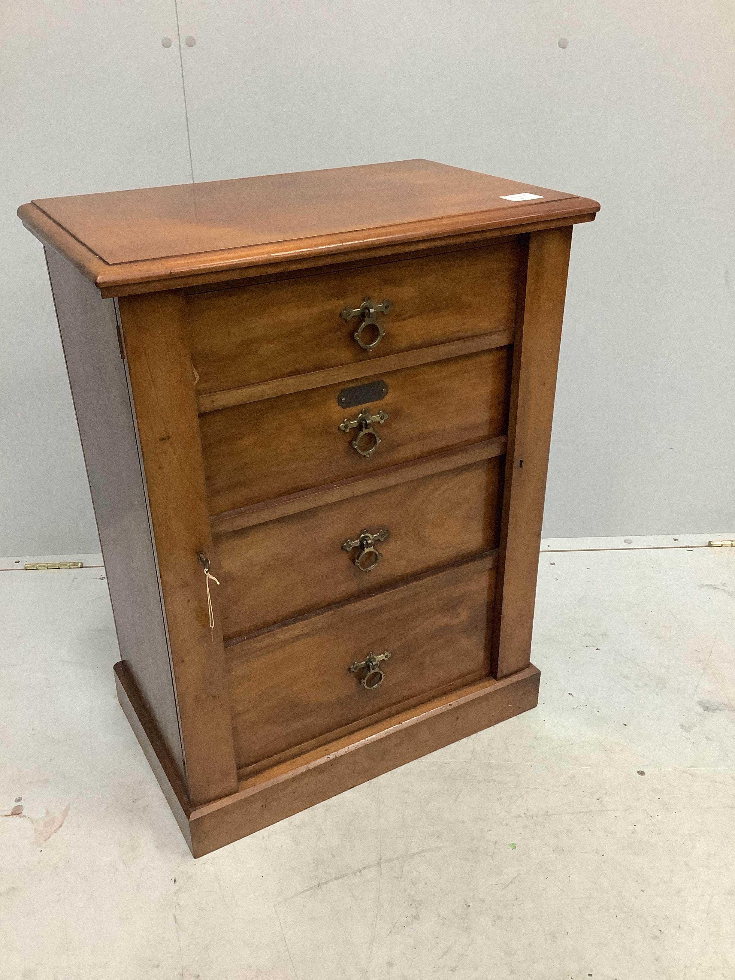 A late Victorian walnut four drawer wellington style chest, brass plaque inscribed 'E A M Fry, May 1884', width 58cm, depth 35cm, height 76cm